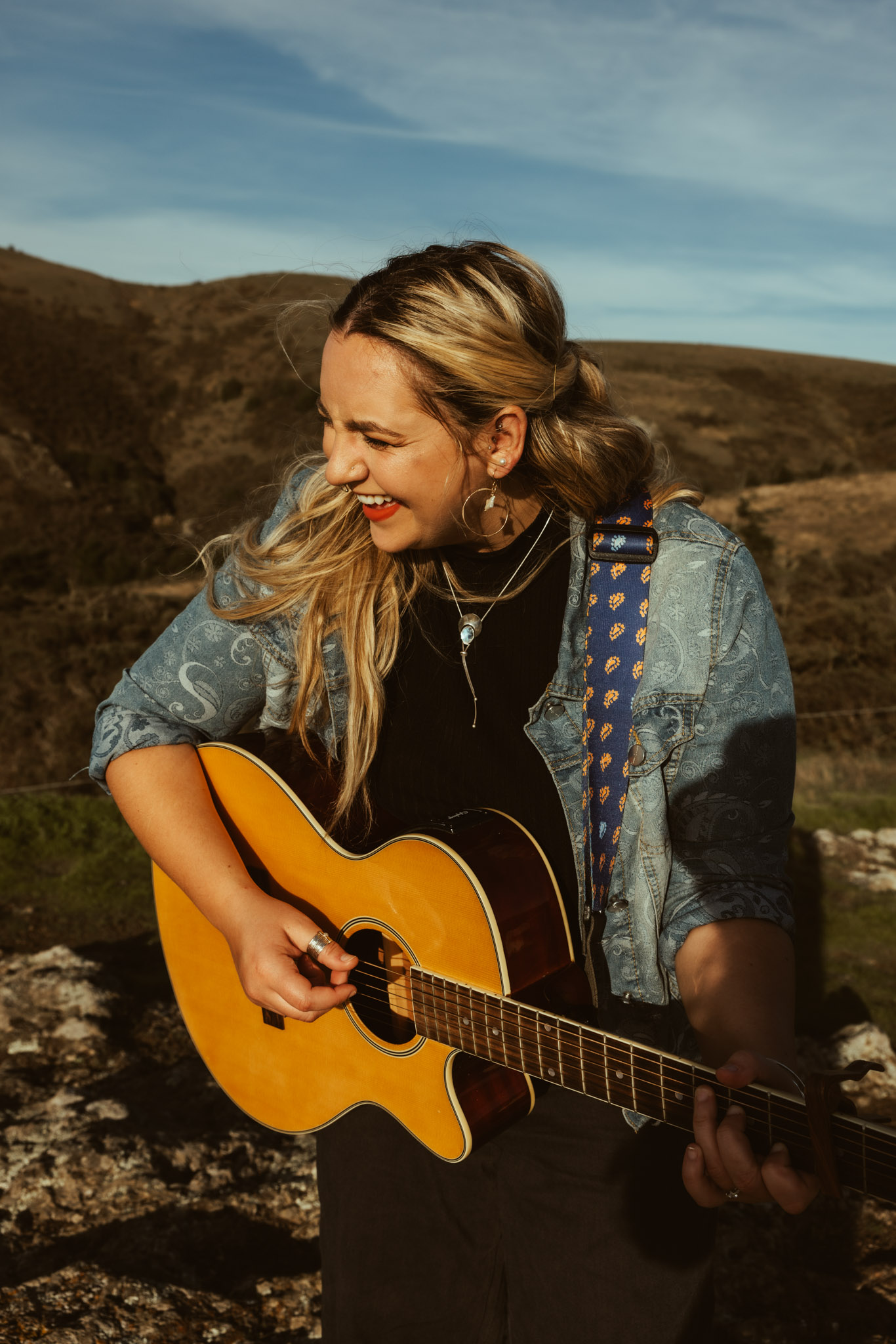 Sunny Mitchell with guitar